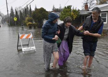 Epic flooding leads to California highway closures and water rescues as the storm system threatens more states